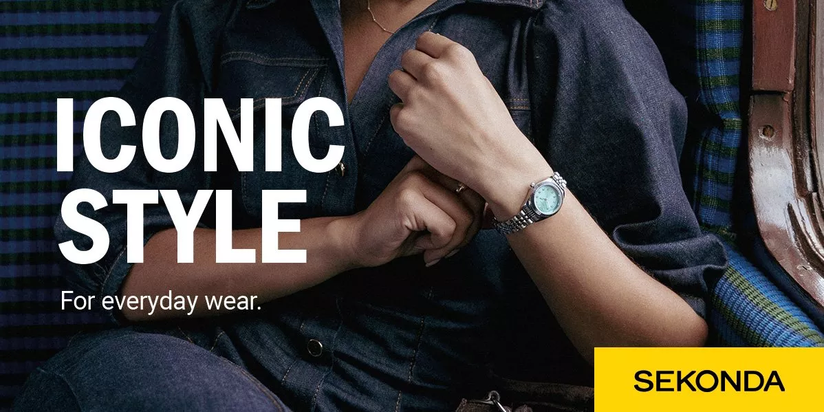 A image featuring a woman in denim wearing a silver watch. Text: Iconic Style for everyday wear.